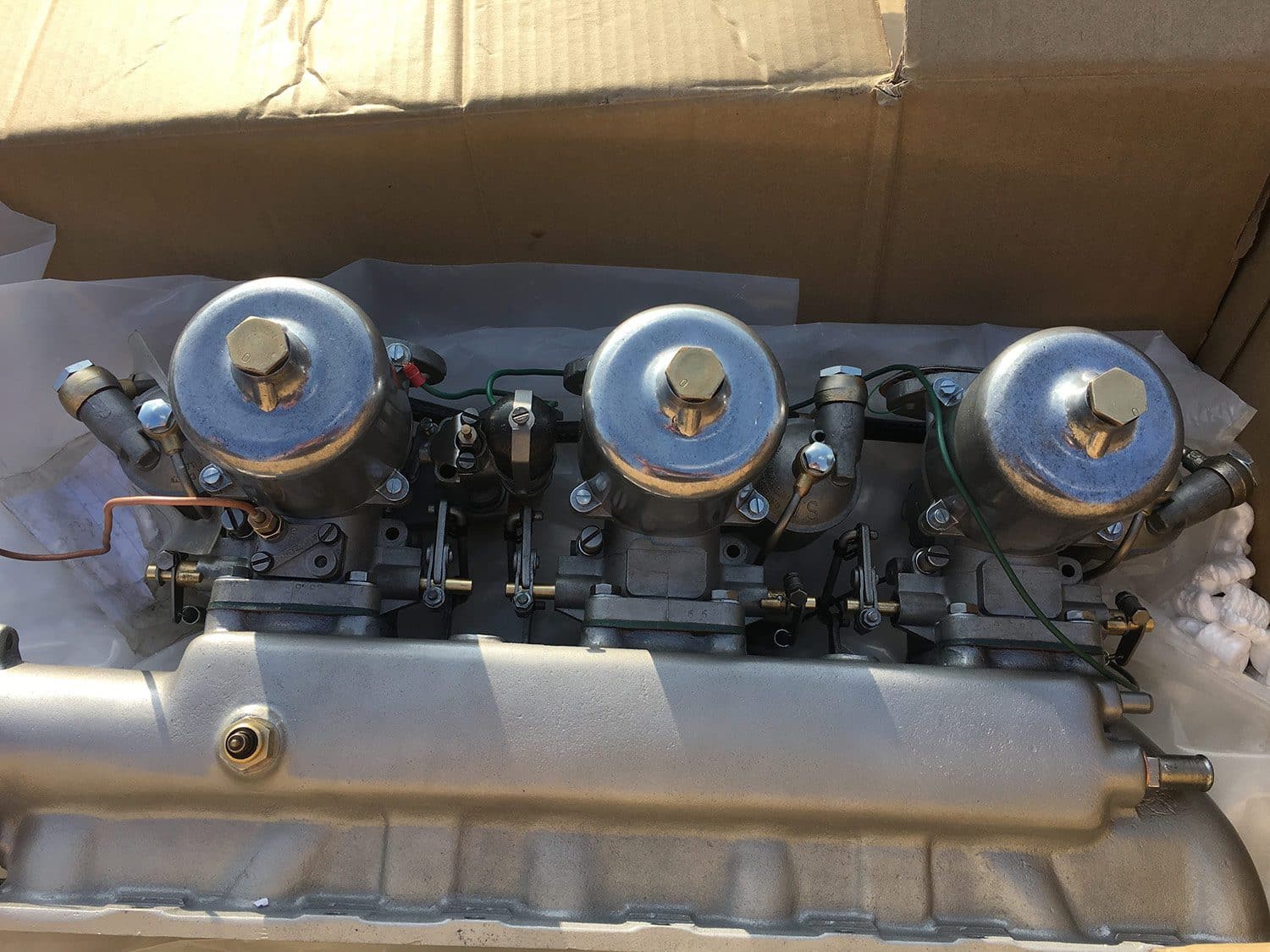 The triple SU Carburetor are now complete Bridge Classic Cars