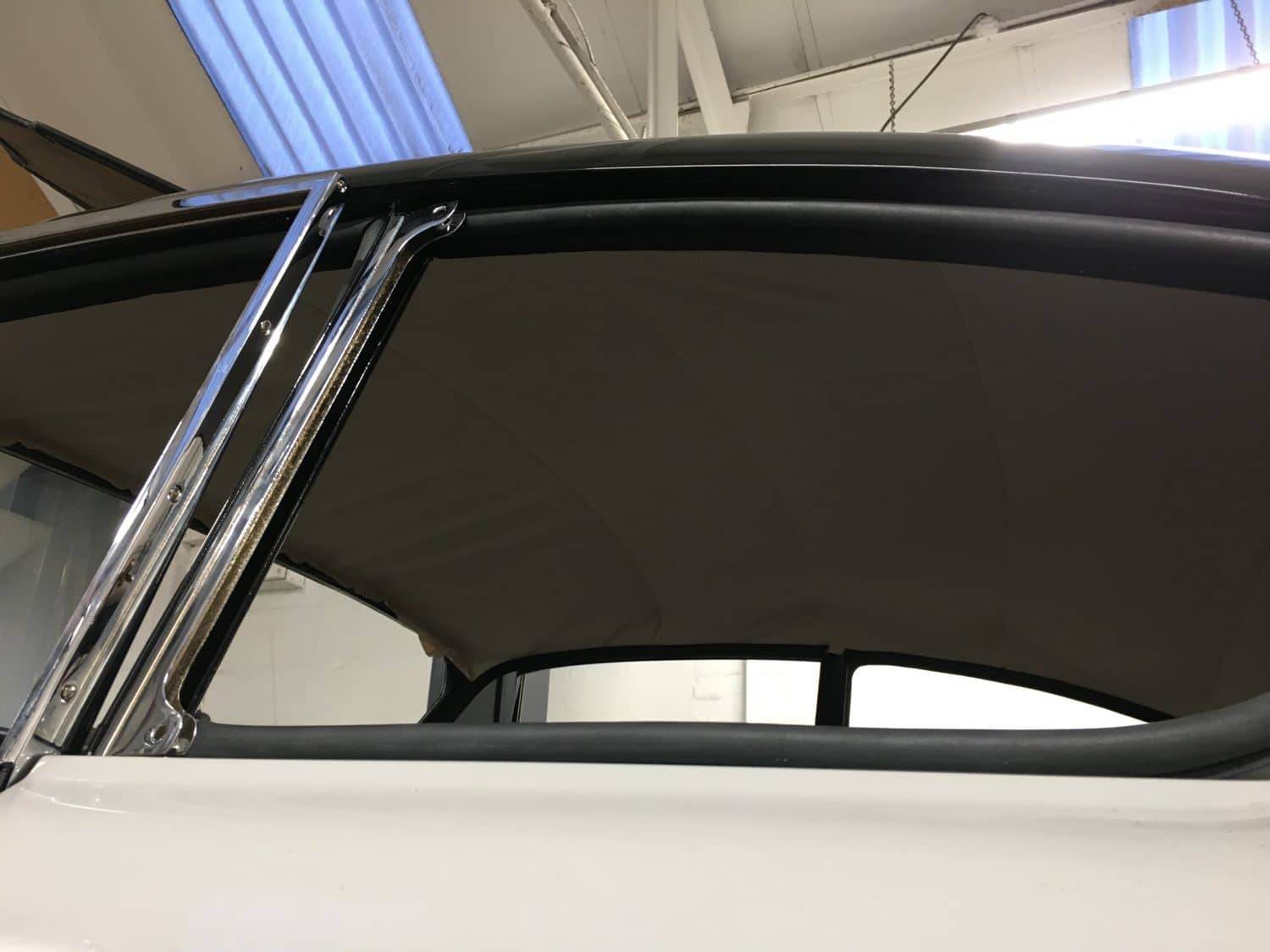 Fitting up the new ceiling cloth Bridge Classic Cars