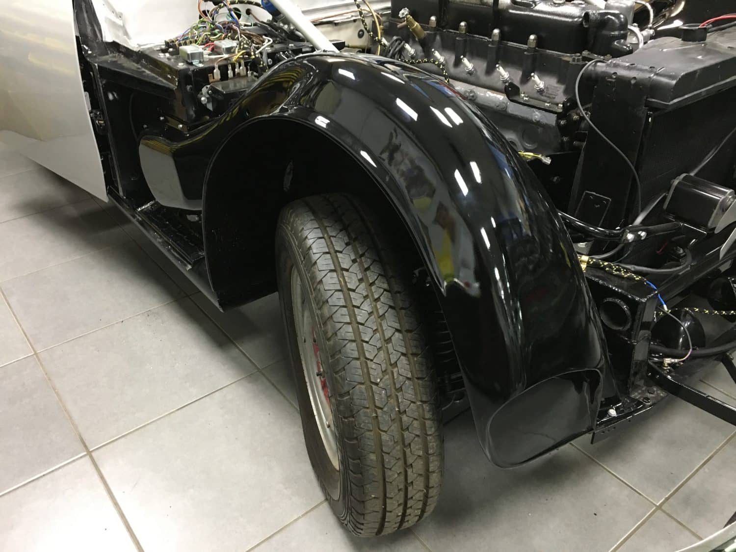 Gloss black wheel arches now fitted Bridge Classic Cars